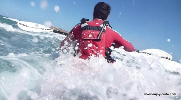 Sea kayak surfing
